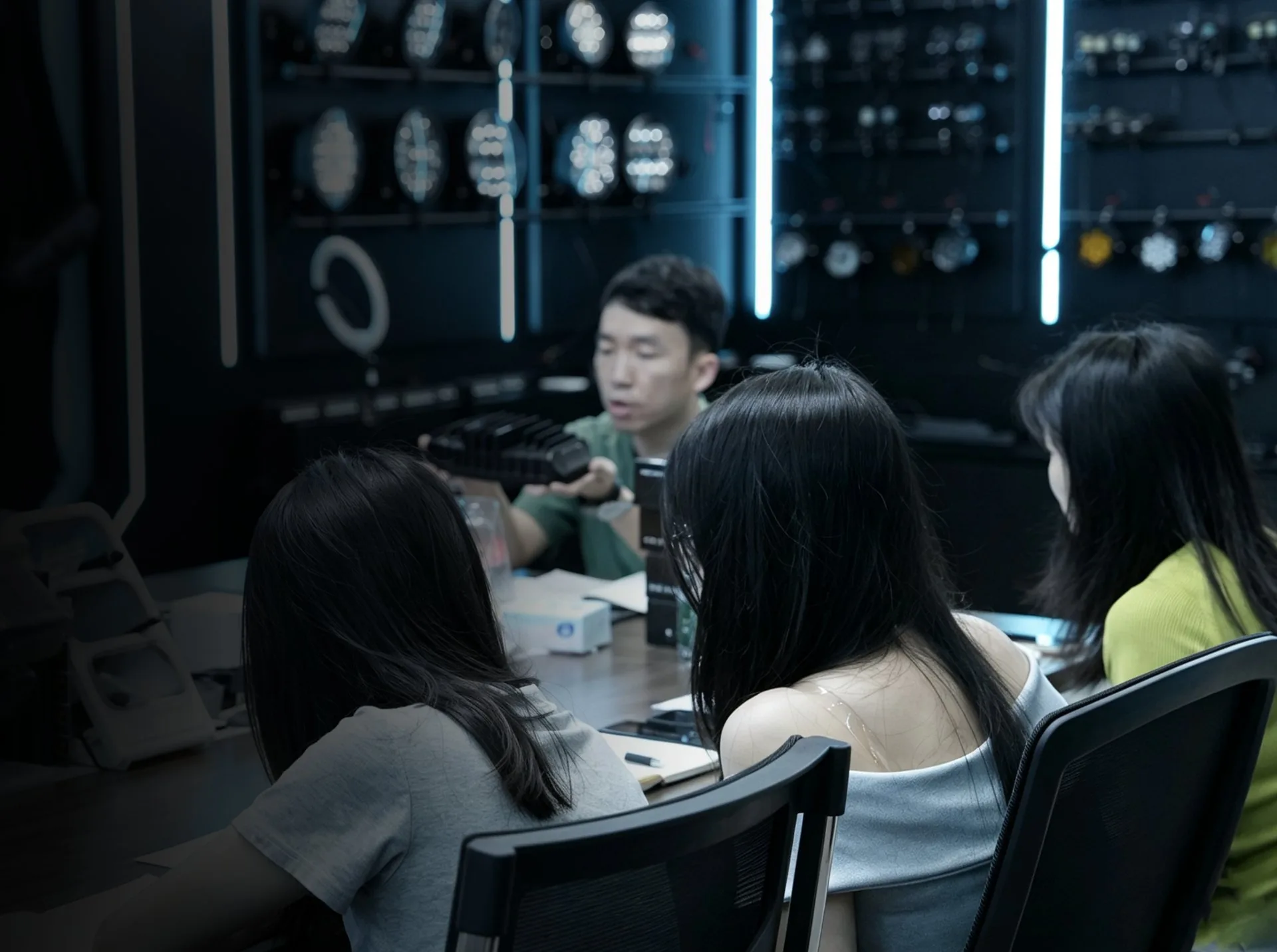 DXZ engineer presenting automotive LED lighting samples to a distributor team during a B2B and OEM batch quality review.