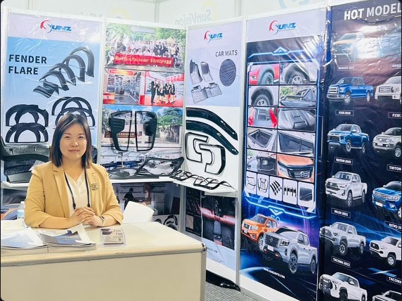 SUNZ auto accessories exhibition booth with pickup truck displays